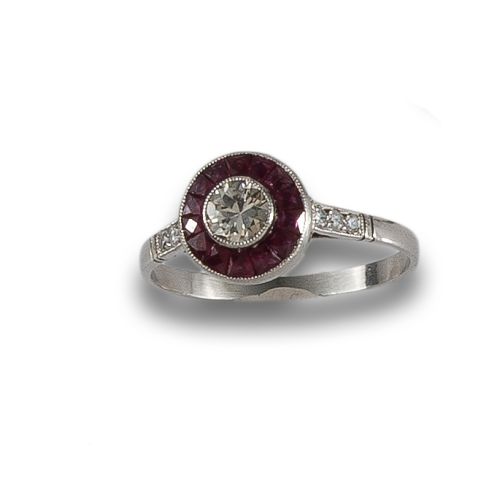 SORTIJA DE PLATINO OJO PERDIZ CON DIAMANTE Y RUBIES