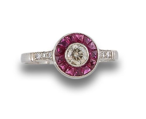 SORTIJA DE PLATINO OJO PERDIZ CON DIAMANTE Y RUBIES