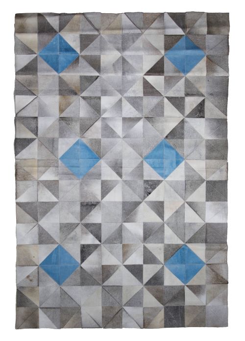 Alfombra de diseño de piel con motivos geométricos en tonos