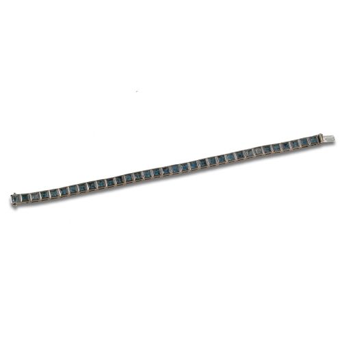 PULSERA DE ORO BLANCO CON GEMAS AZULES