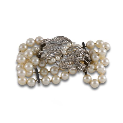 PULSERA DE PERLAS CON GRAN BROCHE CON DIAMANTES