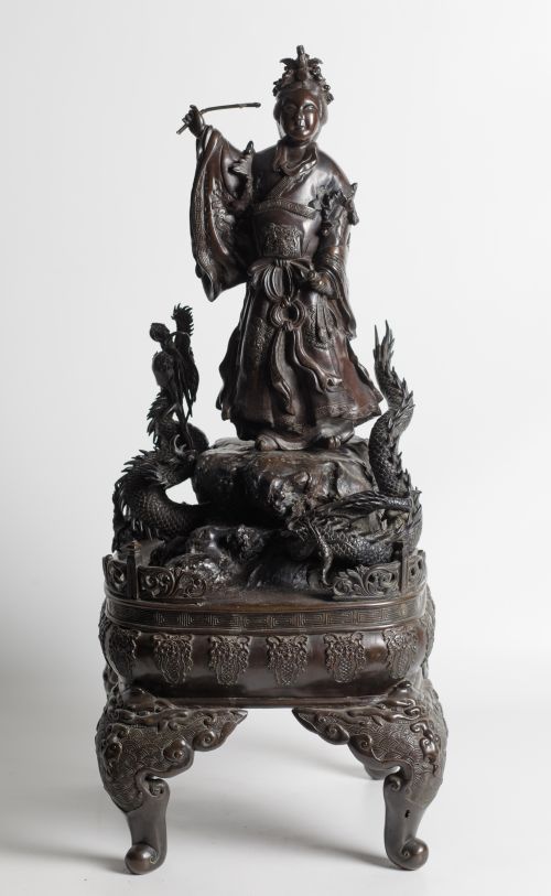 Guanyin con un dragón, figura de bronce patinado, China, S.