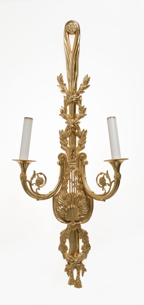 Aplique de pared con dos puntos de luz en metal dorado, est
