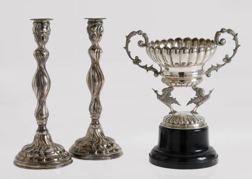 Pareja de candeleros y un trofeo de plata contrastada, Espa