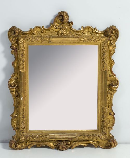 Espejo en madera tallada y sobredorada